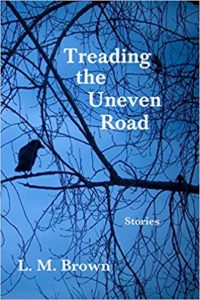 Book cover blue with tree branch & black bird -Review: treading the uneven road