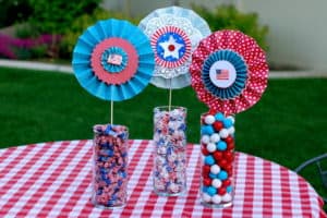 Friday Finds | July 3, 2020 Paper lollypops stuck in tall vases filled with red, white, & blue candies