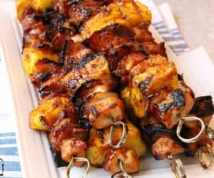Friday Finds June 18-2021 image BBQ chicken Pineapple Kabobs with Bacon from Butterwithasideofbread.com