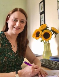 Helen Buckley Author Profile image signing contract