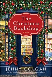 The Christmas Bookshop book cover image of front door of holiday decorated bookshop
