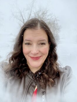 Seed by Shelly Campbell – Guest Post, Excerpt & Giveaway 7 Author Shelly Campbell smiling softly, with wavy brown hair, against a soft ethereal white background. Author of the Dark Walker sci-fi horror trilogy.