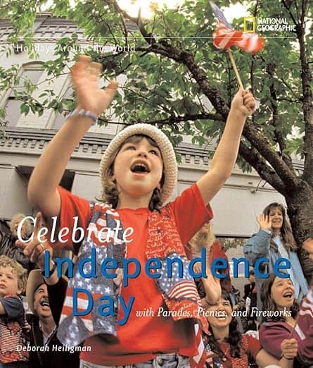 Celebrate Independence Day BOOKCOVER boywaving an American flag at a parade