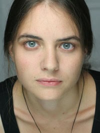 Susanne Schmidt Author Profile image - headshot, striking blue eyes, brown hair