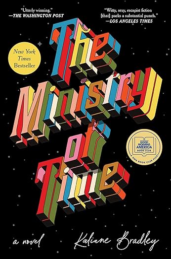 Book cover of The Ministry of Time by Kaliane Bradley. Features the title in bold, retro 3D block letters in shades of red, gold, green, and blue on a black background with tiny white stars. Includes New York Times Bestseller and Read with Jenna book club badges, with praise quotes from The Washington Post and Los Angeles Times at the top.