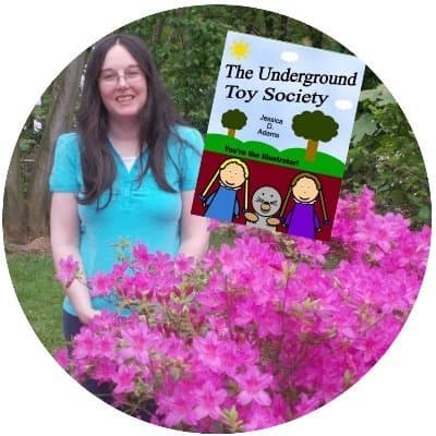 “Author Jessica D. Adams standing outdoors beside bright pink azaleas, smiling while holding a copy of her book The Underground Toy Society.”