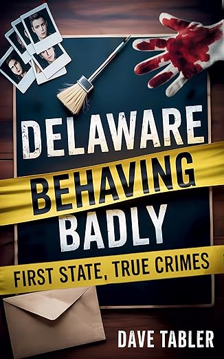 Book cover for Delaware Behaving Badly: First State, True Crimes by Dave Tabler. The design features a dark wooden table with crime scene elements—bloody handprint, broom, photographs, and a manila envelope—framed by yellow caution tape displaying the title. The author’s name appears at the bottom in white text.