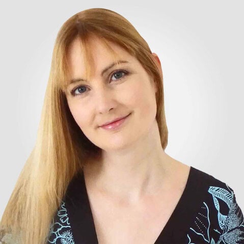"Author photo of Victoria Williamson, award-winning Scottish writer of middle-grade adventure and fantasy novels including Kittiwake Stormhaven and the Pirate's Portolano. She is smiling, with long blonde hair, against a soft gray background.