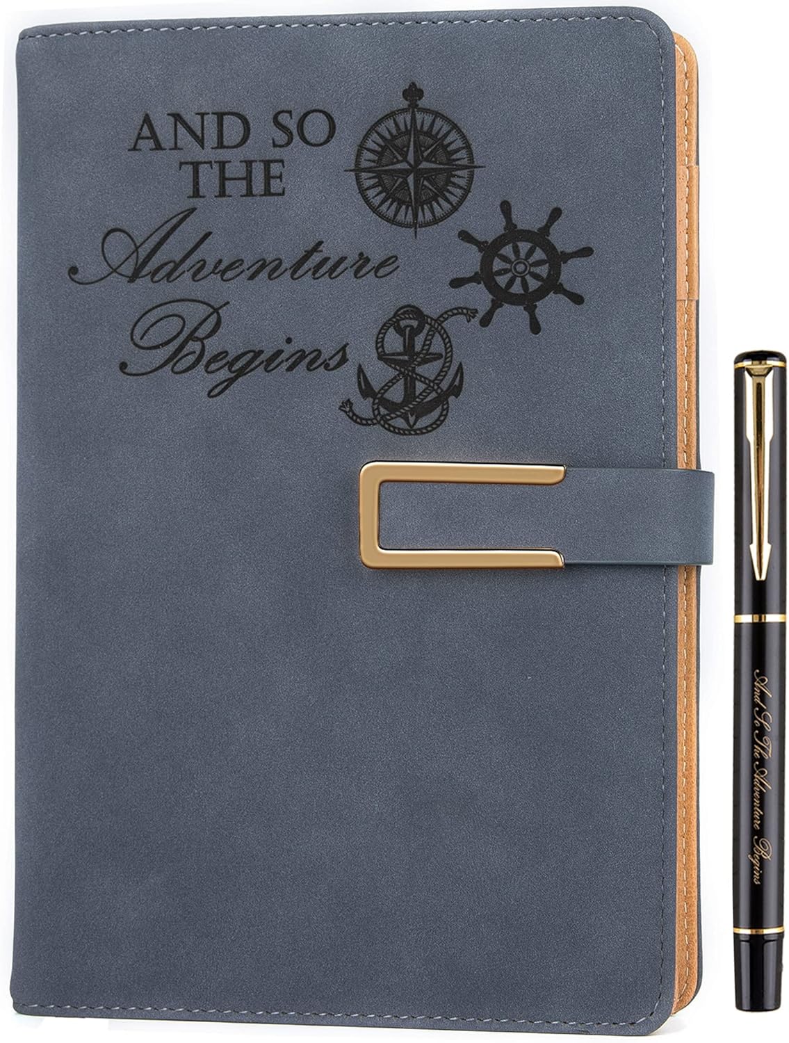 Refillable adventure travel journal in slate blue with stitched edges, strap closure, and nautical compass and anchor graphics reading And So The Adventure Begins, shown with a matching pen. A compact journal suitable for travel notes and personal reflection.
