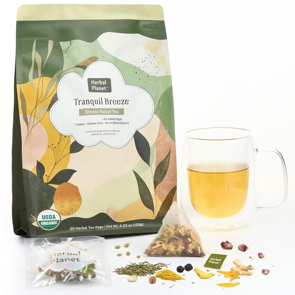 Package of Herbal Planet Tranquil Breeze stress relief tea with illustrated green and gold design, shown beside a clear glass cup of brewed tea. Loose herbal ingredients and tea bags are displayed on a white background.