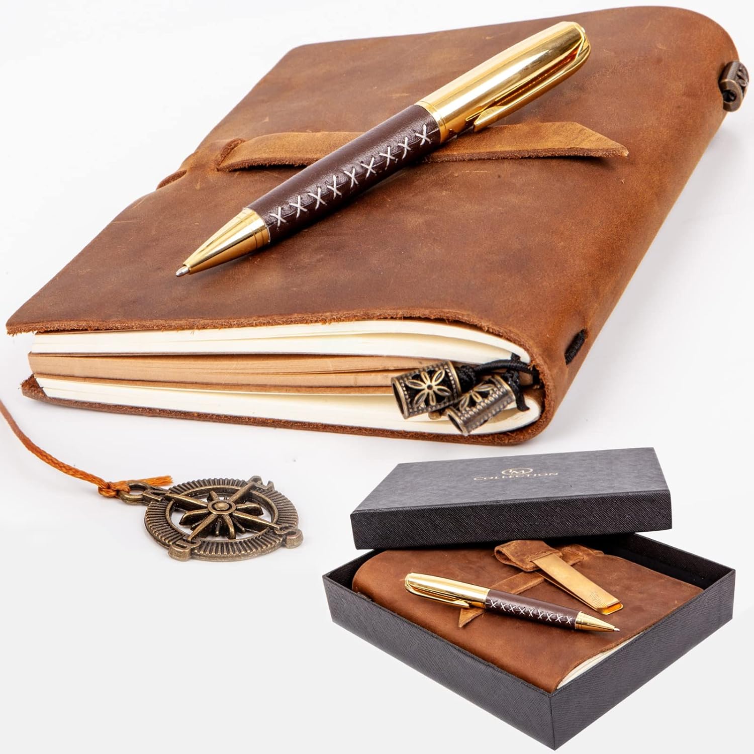 Leather-bound travel journal gift set featuring a brown leather notebook with wrap closure, gold-accented pen, compass charm bookmark, and matching presentation box. Designed as a premium, giftable journaling set for travel and reflection.