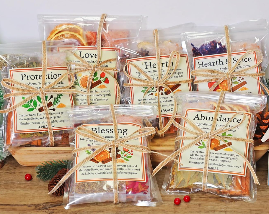 Simmer pot potpourri mix with dried citrus slices, spices, and botanicals designed to add warm fragrance and cozy atmosphere to the home.