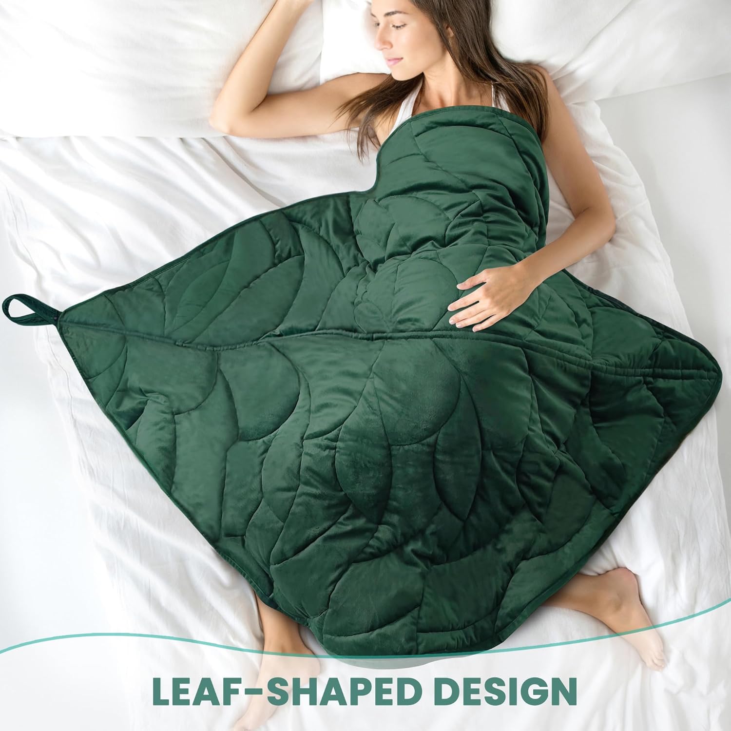 Leaf-shaped weighted lap pad used for grounding comfort while reading, relaxing, or working at a desk.