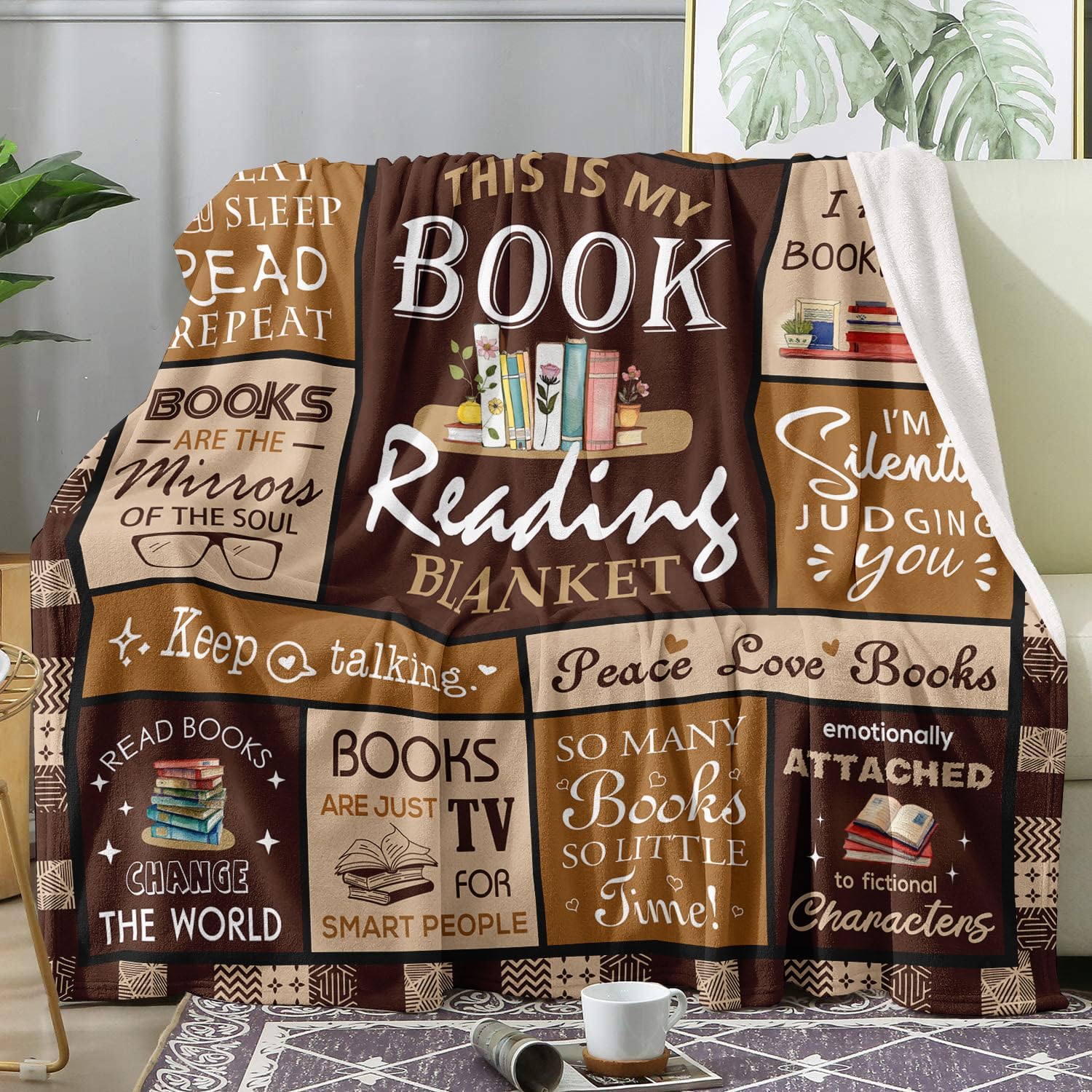 Book Lovers Gift Blanket in a patchwork design covered with quotes for every type of reader