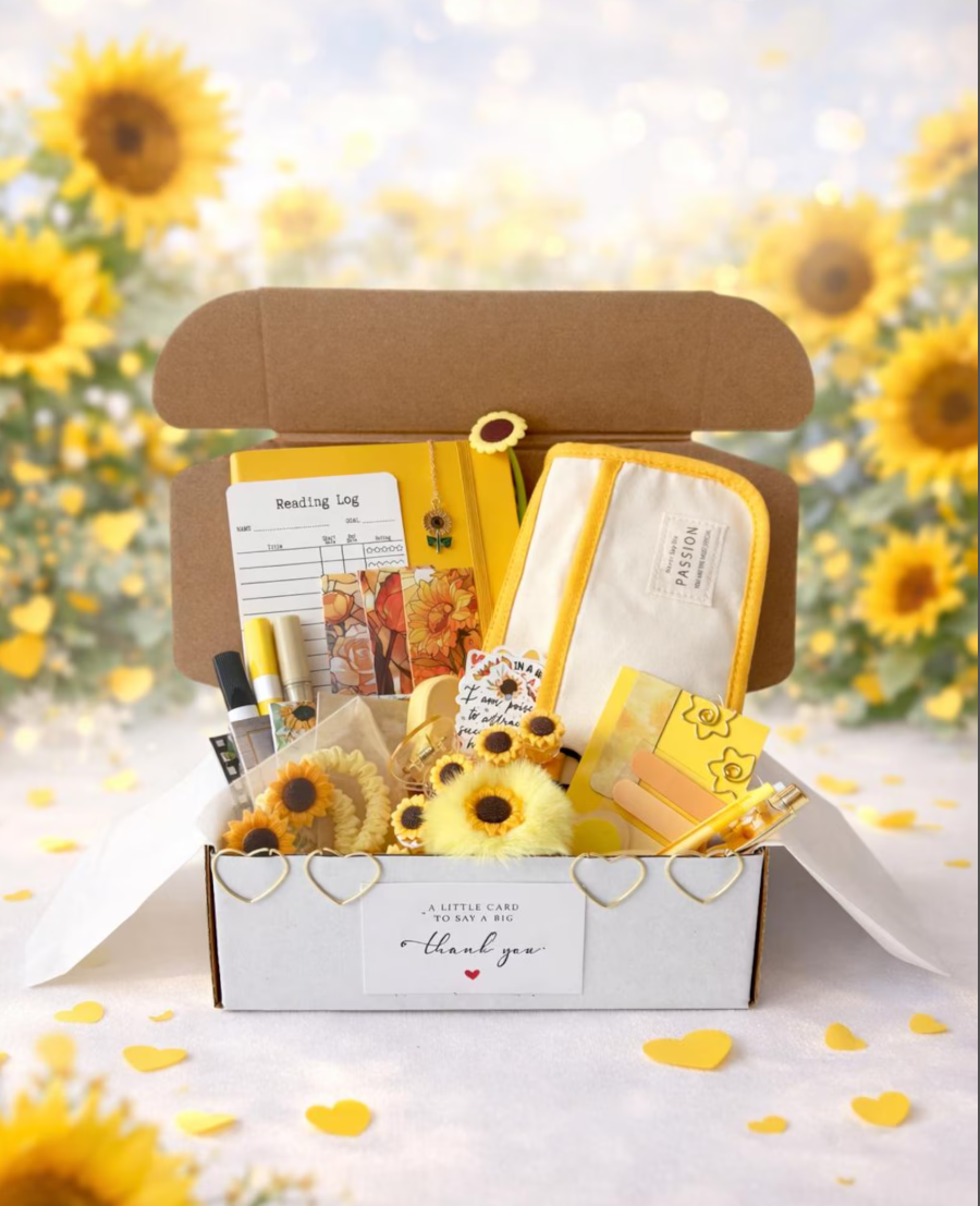 Sunflower-themed stationery gift box with reading journal, pens, bookmarks, and cheerful writing accessories.