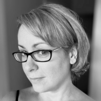 A Little Bird Told Me by Rachael Gray | BBNYA 2025 Finalist Spotlight 2 Black & white headshot of author Rachael Gray