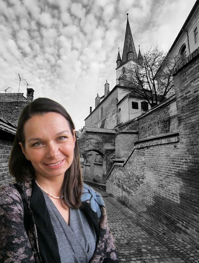 Patricia Furstenberg on a historic street in Sibiu